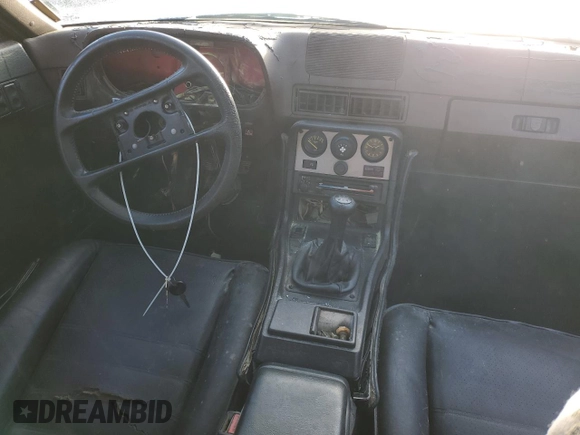 1984 Porsche 944 с VIN WP0AA0946EN459969, выставлен на аукционе Copart как лот 85252584 с пробегом Не указан миль и Списание • Salvage title. История ставок и продаж доступна на DreamBid. Изображение 8.