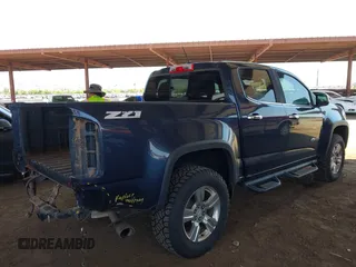2018 Chevrolet Colorado 4WD Z71 z VIN 1GCGTDEN9J1231315, wystawiony jako IAAI lot #42440943 z przebiegiem 171 061 mil mil oraz . Historia ofert i sprzedaży dostępna na DreamBid. Obrazek 4.