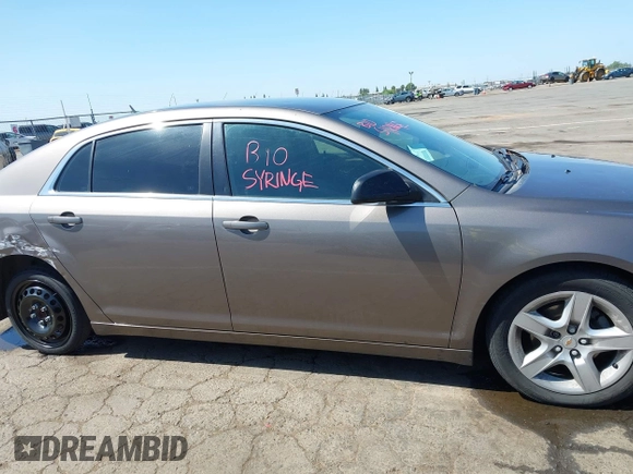 2011 Chevrolet Malibu 1LS with VIN 1G1ZB5E1XBF215846, listed as a IAAI auction lot 42153073 with Not Provided miles and . Bid and sale history available at DreamBid. Image 13.