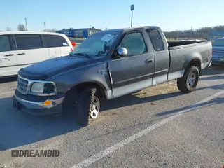 2002 Ford F-150 XL with VIN 1FTRX17L52NA85965, listed as a IAAI auction lot 41796633 with 171,814 mi miles. Bid and sale history available at carsss.com. Image 2.