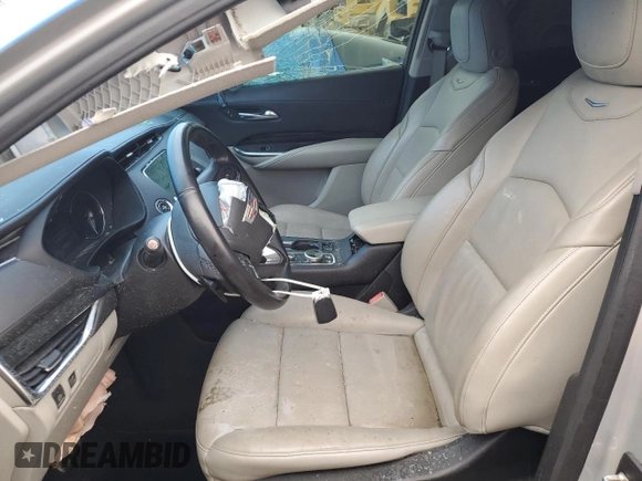2020 Cadillac XT4 FWD Premium Luxury with VIN 1GYFZCR44LF099246, listed as a Copart auction lot 41861735 with 98,018 mi miles and Salvage title. Bid and sale history available at DreamBid. Image 7.