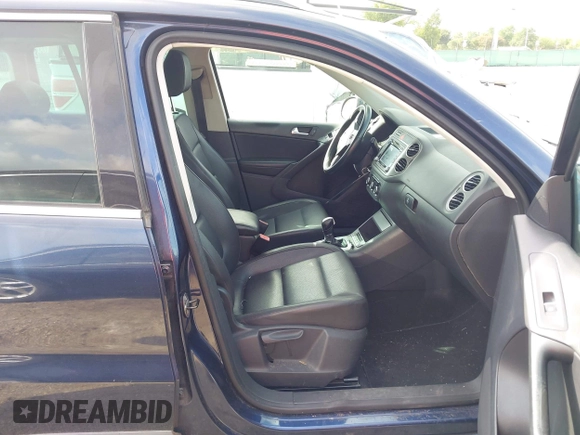 2011 Volkswagen Tiguan SE with VIN WVGAV7AX7BW530357, listed as a IAAI auction lot 42740821 with 170,636 mi miles and . Bid and sale history available at DreamBid. Image 5.