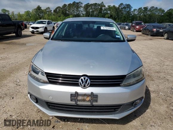 2012 Volkswagen Jetta SEL with VIN 3VWLP7AJ7CM300738, listed as a Copart auction lot 47934894 with 137,877 mi miles and Salvage title. Bid and sale history available at DreamBid. Image 5.