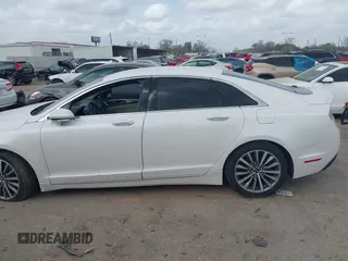 2017 Lincoln MKZ Hybrid Premiere with VIN 3LN6L5KU8HR629821, listed as a IAAI auction lot 41746310 with 106,941 mi miles. Bid and sale history available at carsss.com. Image 14.