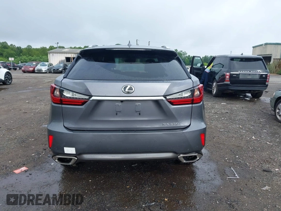 2016 Lexus RX 350 z VIN 2T2BZMCA5GC052214, wystawiony jako IAAI lot #42669843 z przebiegiem 93 891 mil mil oraz . Historia ofert i sprzedaży dostępna na DreamBid. Obrazek 16.