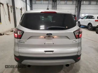 2017 Ford Escape SE z VIN 1FMCU9G90HUA69507, wystawiony jako Copart lot #56594435 z przebiegiem 102 261 mil mil oraz Szkoda całkowita • Salvage title. Historia ofert i sprzedaży dostępna na DreamBid. Obrazek 6.