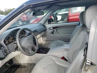 2000 Mercedes-Benz SL-Class with VIN WDBFA68F0YF190618, listed as a Copart auction lot 64791414 with 24,489 mi miles and Salvage Title. Bid and sale history available at carsss.com. Image 7.
