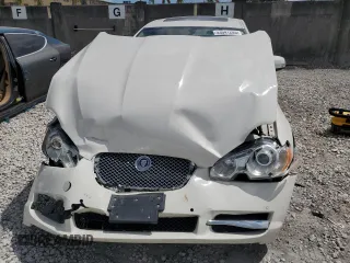 2009 Jaguar XF with VIN SAJXA06B79HR44382, listed as a Copart auction lot 53041205 with 121,245 mi miles and Salvage Title. Bid and sale history available at DreamBid. Image 5.