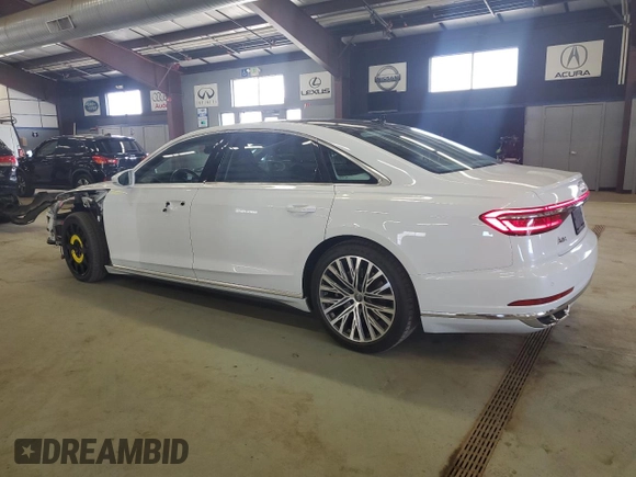 2019 Audi A8 L with VIN WAU8DAF86KN005765, listed as a Copart auction lot 49065575 with 32,600 mi miles and Salvage Title. Bid and sale history available at carsss.com. Image 2.