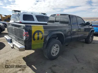 2004 Dodge Dakota SLT with VIN 1D7HG42N44S749267, listed as a Copart auction lot 89313825 with 215,047 mi miles and Salvage Title. Bid and sale history available at carsss.com. Image 3.