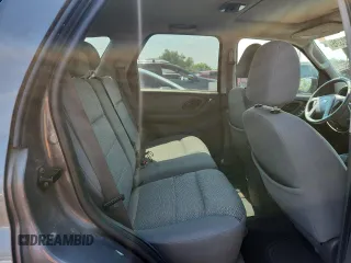 2005 Ford Escape XLT with VIN 1FMYU93135DA09027, listed as a Copart auction lot 63322395 with 144,020 mi miles and Clean title. Bid and sale history available at DreamBid. Image 11.
