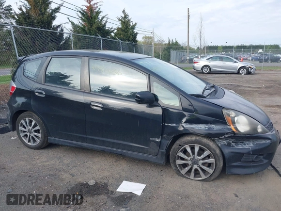 2012 Honda Fit Sport with VIN JHMGE8H52CC022386, listed as a IAAI auction lot 41996636 with 123,070 mi miles. Bid and sale history available at carsss.com. Image 13.