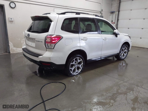 2018 Subaru Forester Touring with VIN JF2SJAWC8JH463943, listed as a IAAI auction lot 41611230 with 65,444 mi miles. Bid and sale history available at carsss.com. Image 4.