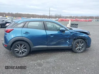 2018 Mazda CX-3 Touring with VIN JM1DKFC78J0322460, listed as a IAAI auction lot 41730662 with 58,841 mi miles. Bid and sale history available at carsss.com. Image 14.