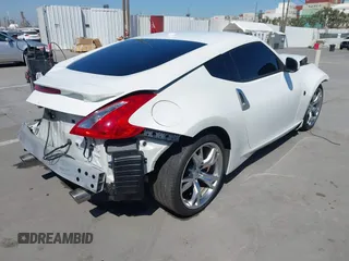 2009 Nissan 370Z Touring with VIN JN1AZ44E99M411252, listed as a IAAI auction lot 41969671 with 91,873 mi miles and . Bid and sale history available at DreamBid. Image 4.