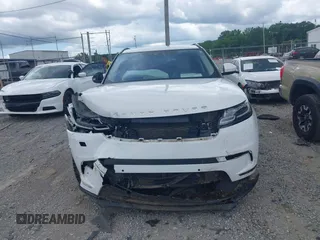 2020 Land Rover Range Rover Velar S z VIN SALYB2EX2LA256971, wystawiony jako IAAI lot #42525724 z przebiegiem 76 802 mil mil oraz . Historia ofert i sprzedaży dostępna na DreamBid. Obrazek 12.