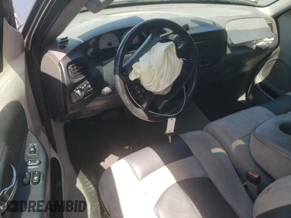 2003 Ford F-150 Lightning with VIN 2FTRF073X3CA56501, listed as a Copart auction lot 61887024 with 0 mi miles and Salvage Title. Bid and sale history available at carsss.com. Image 8.