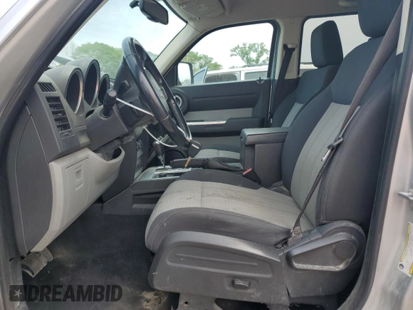 2009 Dodge Nitro SLT with VIN 1D8GU58K09W522094, listed as a Copart auction lot 59765505 with 286,034 mi miles and Salvage title. Bid and sale history available at DreamBid. Image 7.