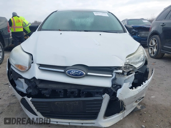 2013 Ford Focus S with VIN 1FADP3E20DL332636, listed as a IAAI auction lot 40917274 with 112,956 mi miles. Bid and sale history available at carsss.com. Image 12.