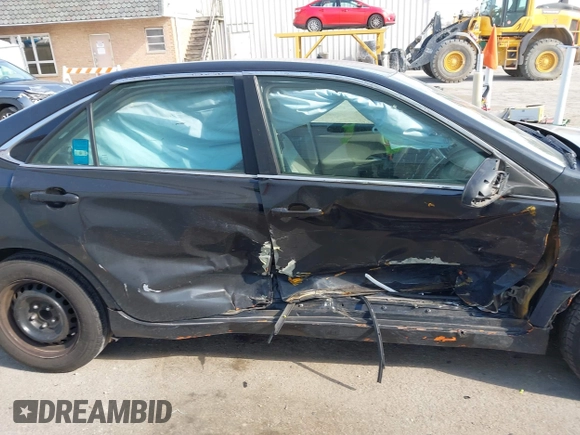 2015 Toyota Camry LE with VIN 4T1BD1FK6FU157623, listed as a IAAI auction lot 42015005 with 300,974 mi miles and . Bid and sale history available at DreamBid. Image 6.