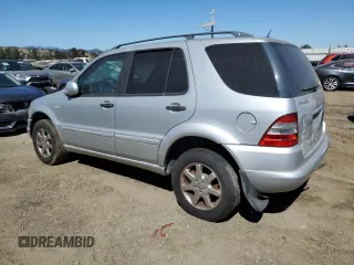 2000 Mercedes-Benz M-Class with VIN 4JGAB72E5YA173269, listed as a Copart auction lot 71520714 with 239,248 mi miles and Clean Title. Bid and sale history available at carsss.com. Image 2.