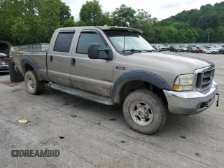 2003 Ford F-350 XL with VIN 1FTSW31F13EA50456, listed as a Copart auction lot 62838035 with 214,969 mi miles and Salvage title. Bid and sale history available at DreamBid. Image 4.