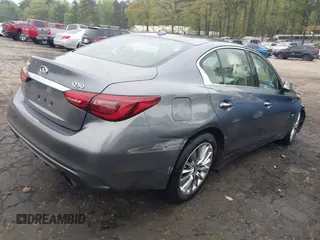 2019 Infiniti Q50 Luxe z VIN JN1EV7AP5KM518681, wystawiony jako IAAI lot #41958746 z przebiegiem 66 629 mil mil oraz . Historia ofert i sprzedaży dostępna na DreamBid. Obrazek 4.