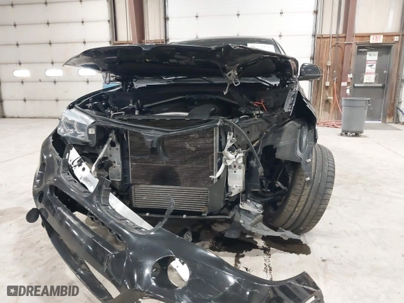 2019 BMW X6 xDrive35i with VIN 5UXKU2C51K0Z64897, listed as a IAAI auction lot 41759156 with 64,434 mi miles. Bid and sale history available at carsss.com. Image 6.