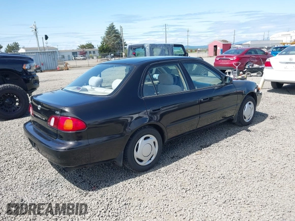 1999 Toyota Corolla VE z VIN 1NXBR12E9XZ205120, wystawiony jako IAAI lot #42216177 z przebiegiem 175 508 mil mil oraz . Historia ofert i sprzedaży dostępna na DreamBid. Obrazek 4.