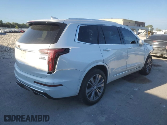 2020 Cadillac XT6 FWD Premium Luxury z VIN 1GYKPCRS9LZ107178, wystawiony jako Copart lot #72359154 z przebiegiem 154 427 mil mil oraz Nie do naprawy. Historia ofert i sprzedaży dostępna na DreamBid. Obrazek 3.