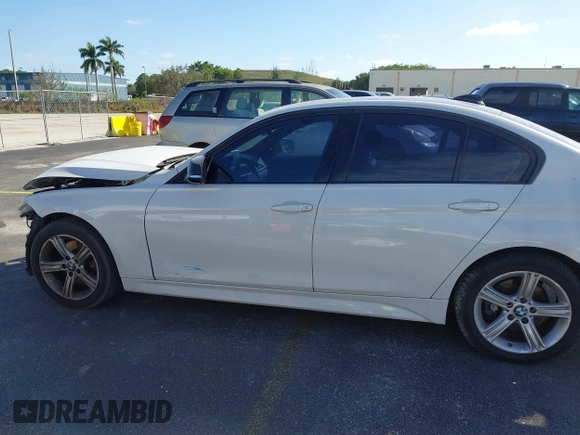 2014 BMW 3 Series 328i with VIN WBA3A5C55EP647035, listed as a IAAI auction lot 41480711 with 105,792 mi miles. Bid and sale history available at carsss.com. Image 14.