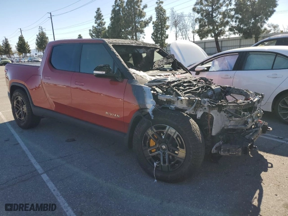 2023 Rivian R1T Adventure with VIN 7FCTGAAA0PN024599, listed as a Copart auction lot 50269955 with 0 mi miles and Salvage Title. Bid and sale history available at carsss.com. Image 4.