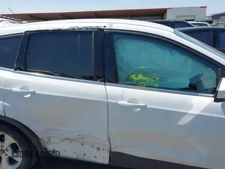 2016 Ford Escape SE with VIN 1FMCU9GXXGUC29728, listed as a IAAI auction lot 41857102 with 161,148 mi miles. Bid and sale history available at carsss.com. Image 12.