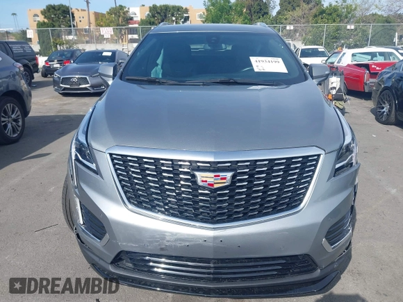 2023 Cadillac XT5 FWD Luxury z VIN 1GYKNAR49PZ137556, wystawiony jako IAAI lot #41934199 z przebiegiem 13 298 mil mil oraz . Historia ofert i sprzedaży dostępna na DreamBid. Obrazek 12.