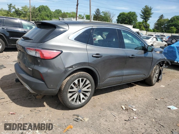 2020 Ford Escape Titanium с VIN 1FMCU9J99LUC63261, выставлен на аукционе Copart как лот 56312955 с пробегом Не указан миль и Списание • Salvage title. История ставок и продаж доступна на DreamBid. Изображение 3.