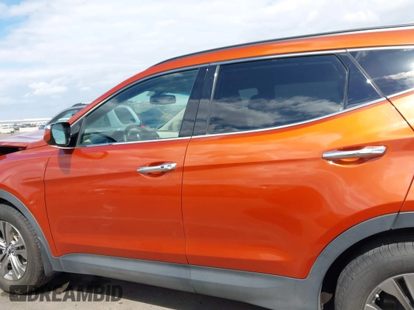 2014 Hyundai Santa Fe z VIN 5XYZUDLB4EG138898, wystawiony jako IAAI lot #42196491 z przebiegiem Nie podano mil oraz . Historia ofert i sprzedaży dostępna na DreamBid. Obrazek 14.