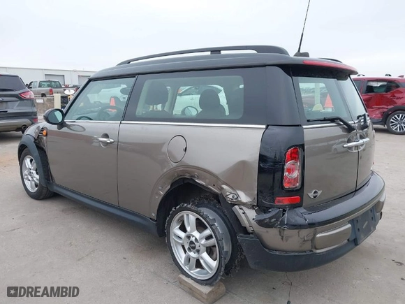 2013 MINI Cooper Clubman with VIN WMWZF3C51DT489508, listed as a IAAI auction lot 41748025 with 65,305 mi miles. Bid and sale history available at carsss.com. Image 3.