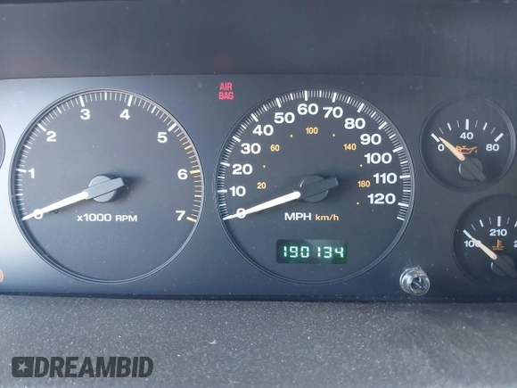 1999 Jeep Grand Cherokee Laredo with VIN 1J4GW58NXXC623753, listed as a IAAI auction lot 41685540 with 190,134 mi miles and . Bid and sale history available at DreamBid. Image 7.