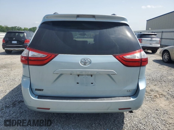 2015 Toyota Sienna LE AAS with VIN 5TDKK3DC9FS609084, listed as a Copart auction lot 57055295 with 247,531 mi miles and Salvage title. Bid and sale history available at DreamBid. Image 6.
