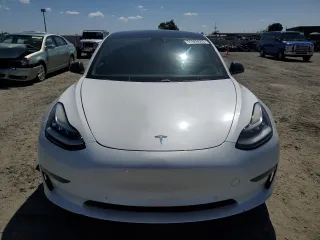 2021 Tesla Model 3 Standard Range Plus with VIN 5YJ3E1EA4MF849187, listed as a Copart auction lot 51689605 with 77,266 mi miles and Salvage Title. Bid and sale history available at carsss.com. Image 5.