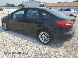 2016 Ford Focus SE with VIN 1FADP3F22GL233402, listed as a Copart auction lot 60854175 with 77,002 mi miles and Salvage title. Bid and sale history available at DreamBid. Image 2.