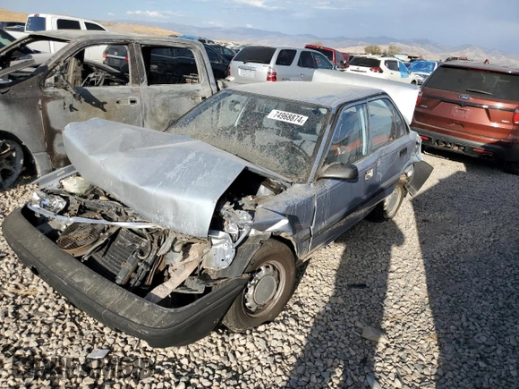 1988 Toyota Corolla with VIN JT2AE92E9J3140852, listed as a Copart auction lot 74968874 with 169,427 mi miles and Salvage title. Bid and sale history available at DreamBid. Image 1.