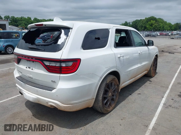 2015 Dodge Durango R/T with VIN 1C4SDJCT4FC938647, listed as a IAAI auction lot 42370175 with 179,686 mi miles and . Bid and sale history available at DreamBid. Image 4.