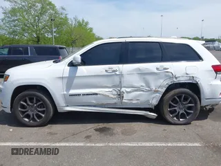 2021 Jeep Grand Cherokee Overland with VIN 1C4RJFCG6MC592296, listed as a IAAI auction lot 42170899 with 56,553 mi miles and . Bid and sale history available at DreamBid. Image 6.