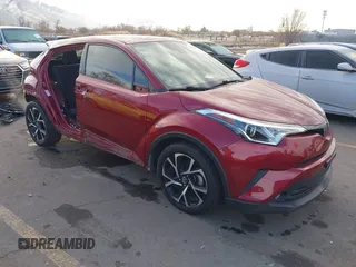2018 Toyota C-HR XLE z VIN NMTKHMBX2JR025112, wystawiony jako IAAI lot #41020935 z przebiegiem 94 674 mil mil oraz . Historia ofert i sprzedaży dostępna na DreamBid. Obrazek 1.