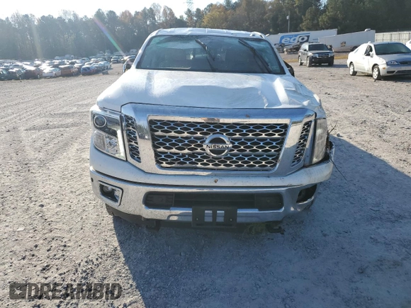 2019 Nissan Titan XD SL with VIN 1N6BA1F43KN511419, listed as a Copart auction lot 77875274 with 27,447 mi miles and Salvage Title. Bid and sale history available at carsss.com. Image 5.