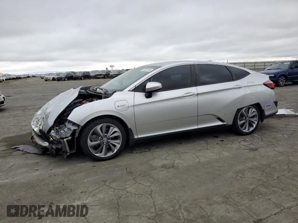 2018 Honda Clarity with VIN JHMZC5F16JC021736, listed as a Copart auction lot 71761784 with 93,541 mi miles and Salvage Title. Bid and sale history available at DreamBid. Image 1.