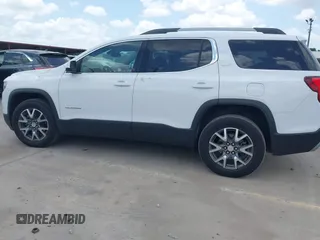 2023 GMC Acadia SLT with VIN 1GKKNUL45PZ201984, listed as a IAAI auction lot 42529929 with 52,263 mi miles and . Bid and sale history available at DreamBid. Image 14.
