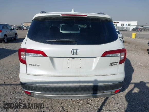 2022 Honda Pilot Touring 7-Passenger with VIN 5FNYF6H67NB017660, listed as a IAAI auction lot 41194603 with 87,301 mi miles. Bid and sale history available at carsss.com. Image 16.