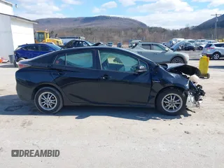 2016 Toyota Prius Four with VIN JTDKARFU4G3016330, listed as a IAAI auction lot 41661639 with 92,311 mi miles. Bid and sale history available at carsss.com. Image 13.